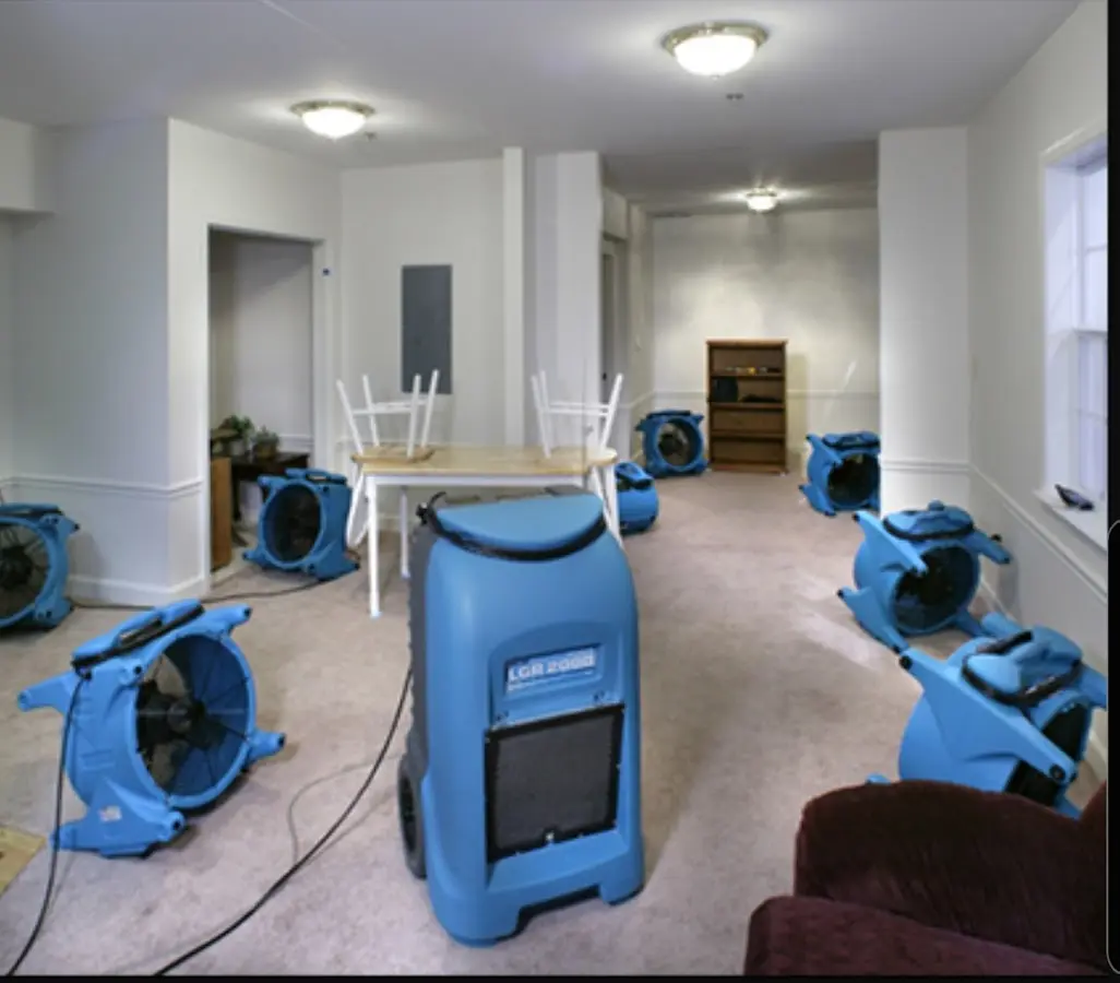 Air movers and dehumidifier setup for Water Extraction & Removal in Chaparral